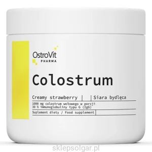 OstroVit Pharma Colostrum 100 g kremowej truskawki